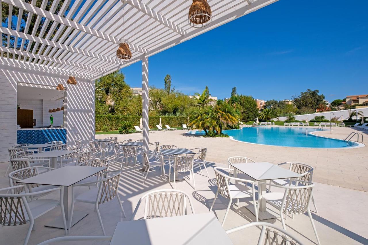 فندق ومطعم ماليبو فوز فيغيورا دا فوز المظهر الخارجي الصورة The pool at the hotel