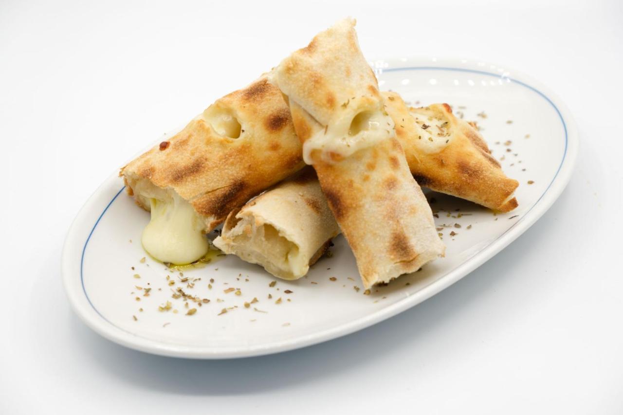 فندق ومطعم ماليبو فوز فيغيورا دا فوز المظهر الخارجي الصورة Tequeños